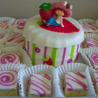 Strawberry Shortcake And Petits Fours Strawberry Shortcake cake made for Birthday party. Vanilla cake filled with strawberry cream cheese filling, covered in vanilla butter...