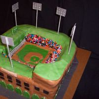 Fenway Park Triple chocolate cake, filled with chocolate butter cream, two 12 inch squares stacked, then carved. Covered in choco butter cream and MMF...