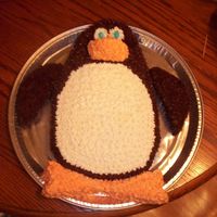 Penguin Cake My son requested a penguin cake for his 3rd birthday. I made it from two rectangle cakes cut to shape. Covered it in vanilla and chocolate...