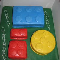 Lego Blocks Cake Made this for my son's Birthday. He wanted a Lego cake. Everyone just loved it. Variety of shapes covered in fondant. My first time to...