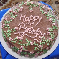 Chocolate Cake chocolate cake with drop flowers in buttercream icing