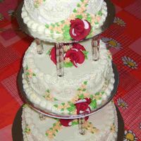 My First Wedding Cake This was a choclate cake, with buttercream icing and royal icing roses.