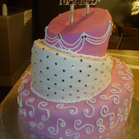 Bring On The Bling My cousins wedding cake I did for there at home reception party. His new wife wanted something fun and full of Bling. Top and bottom tier...