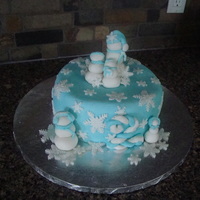 Another Snowflake Birthday For Maddie We did another party for family on her real birthday so I kept with the snowflake, winter theme. Cake is covered in MMF and all accents,...