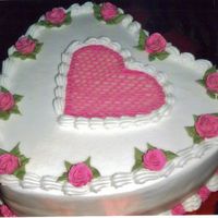 Hearts And More Hearts HEART PAN, BC ICING, ROYAL ICING ROSES AND STRING WORK CENTER HEART.