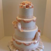 Wedding Cake All fondant with fondant/gumpaste bowes