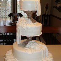Wedding Cake All fondant with fondant drape and ribbon roses
