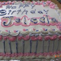 Cimg1690.jpg Ice cream cake with whipped cream icing.