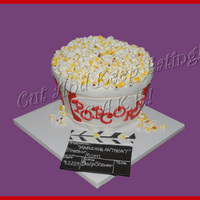 Popcorn Anyone! My first sculpted cake that my DH actually carved. Vanilla flavored cake with vanilla BC popcorn made from marshmallows. This was a fun...