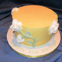 82Nd Birthday Buttercup 82nd Birthday Buttercup Yellow with White Flower GroupingsCovered with SMBC. This was my first try at a smooth finish with SMBC.