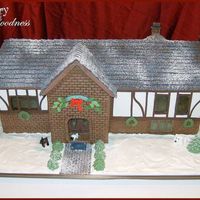 Tudor Style Gingerbread House The board is a 24x30...So this house is a pretty good size! Around 14" tall.