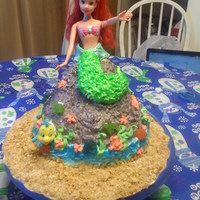 Ariel my daughter request a "Ariel on a rock" cake for her birthday and this the result! she was THRILLED and i was relieved lol.