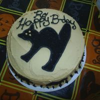 S4010232.jpg peanut butter cake w/ peanut butter icing. would have been better w/out the writing LOL