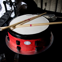 Snare Drum Cake Snare Drum Cake made to be a replica of the grooms beloved drum. Buttercream icing with fondant details.