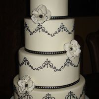 Dsc06175.jpg Gumpaste flowers, RI piping over fondant. Cake Dummy