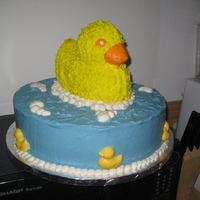 Rubber Duckies This cake is in butter cream. I used a mold from wiltons for the big duck. The bubbles are buttercream too. The little ducks on the sides...