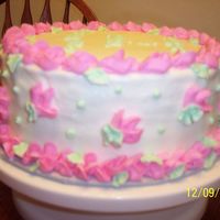 Birthday Cake This is a cake I made for my best friends birthday and her twin sister. Its decorated in buttercream.