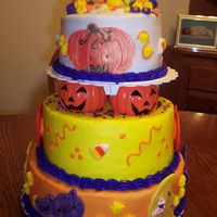 Halloween Cake ( Front View ) I just finished an advanced wedding cake class. Instead of taking a wedding cake for my final class I decided to do something to get myself...