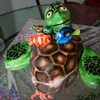 Finding Nemo, Crush, Marlin, Dory And Squirt Marlin, Dory and Squirt molded out of MMF and airbrushed color.Crush is three sheet cakes stacked and sculpted. Covered in MMF and...