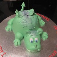 Lil Dragon This was made for my daughter's class cake raffle. Wanted to try doing a dragon cake and this was a good excuse.