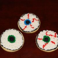 Eyeballs I don't know who (other than kids) would eat a cookie decorated like an eyeball, but they were fun to make. Almond bc icing.