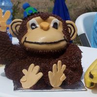 Monkey Picture A monkey cake for my sons birthday. His legs are crossed but you can't tell in the picture :)