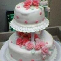Wilton Course Iii-Final Cake This was my Course III final cake. Roses are made out of fondant and cake is covered in MMF. Everyone at work loved it.