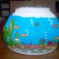Life In A Fishbowl i saw this pic in a magazine and wanted to try it. used 10" round cake, and buttercream frosting. the seaweed is fruit rollup and the...