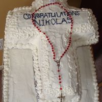 First Communion Bottom tier was chocolate, top tier white. Didn't turn out as well as I expected, but thats what happens when you try to decorate a...