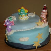 Care Bears My first try at a topsyturvey cake. Only 2 tiers, but I learned alot & can hardly wait to try again. PS - my daughter who wanted the...