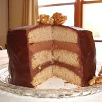 Chocolate Chesnut Cake With Inside View The layers are the actual Chesnut cake, a Chocolate Ganache and a Chesnut Buttercream. The cake is covered in a Chocolate Ganache and...