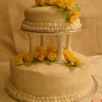 Wilton Class Iii Final Cake Vanilla Cake decorated with Fondant, Buttercream Frosting and Fondant Roses/leaves.