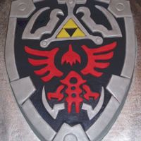 Legend Of Zelda Hylian Shield Made this for my grandson's 18th birthday. He is a Legend of Zelda fanatic and has the real shield that I used as the model. Carved...