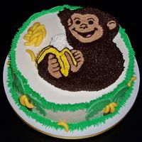 Monkey Cake Monkey cake for a girl's birthday. Monkey/banana shaped tier in chocolate cake was cut from a 9X13 and details added in BC. Bottom...
