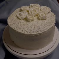 My First Decorated Cake & First Buttercream Roses This is my very first decorated cake. There are so many things that i would do differently. But it is a scratch devils food cake w/choc...