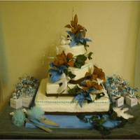 Wedding For My Mommie I flew to California and made this cake in 9 hours for my mother's wedding. Four flavors - coconut cake with cream cheese filling,...