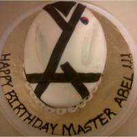 Martial Arts Cake For my son's master, very last minute but it came out cute~carrot cake with mandarine orange buttercream.