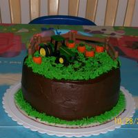 3Rd Birthday Cake I saw a fall cake on here that I loved.My son loves tractors so, I replaced the scarecrow with a tractor.