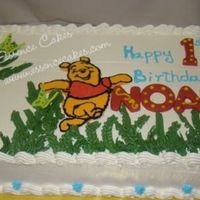 Winnie-The-Pooh Vanilla cake filled and frosted with buttercream.