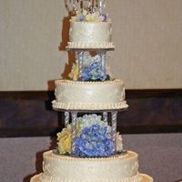 Wed_4590.jpg My first Wedding Cake for my son's wedding. White Chocolate cake from the with Raspberry filling. Butter Cream Frosting. Silk...