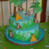 Amanda And Andy's Shower Cake Safari themed shower cake made to kinda match the invitations, wanted to include giraffes and monkeys. Mom was happy.