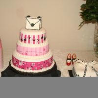 Zakiyyah_Retirement_Party_010.jpg Birthday cake for my niece; bow cake is my sister's birthday cake. I purchased the edible transfers from Global Sugar Art.