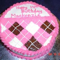 Argyle Birthday Cake yellow cake with buttercream icing, my daughter loves argyle so made diamond patterns with square cutter, outlined and then iced.