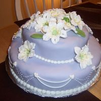 3Rd Course Final Cake I really liked the easter lilies, so that is the flower I choose for my final, the top cake is a carrot cake the bottom one is a madeira...
