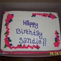 Birthday Flowers birthday cake made for our neighbor. Chocolate chocolate cake with buttercream. drop flowers and leaves.