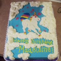 Unicorn In Clouds This cake was done for my niece for her 9th birthday. She loves horses and unicorns and everything fairytale. This is a 1/2 sheet cake done...