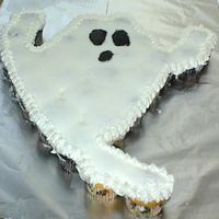 Ghost Cupcake Cake This was my first attempt at a cupcake cake. I made chocolate and yellow cupcakes. (chocolate where much harder to cover). There are a lot...