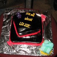 103-0377_Img.jpg Bottom is choc cake, top butter cake(some kids in class cant eat choc). White mmf painted black. My first "public cake". Will...