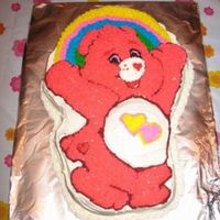 Care Bear 1St Bday Pink Care bear made with Strawberry cake and buttercream icing. Wilton pan.