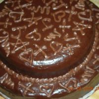 All Chocolate Thank You 6" and 8" layers w/hershey's icing. chocolate "transfers" piped on parchment and placed on top. thank you cake...